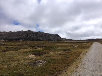 View of landscape against cloudy sky