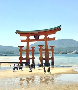 Built structure at beach against sky