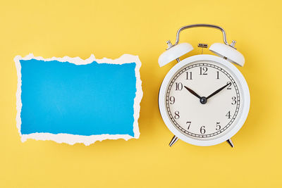 Close-up of clock against white background