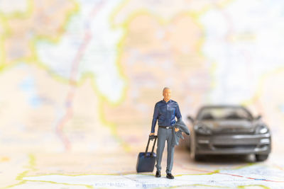 Man standing on road in city