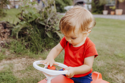 Cute girl playing in backyard