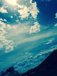 Scenic view of landscape against cloudy sky