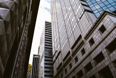 Low angle view of modern buildings against sky