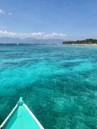 Boat in sea against sky