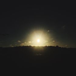 Silhouette landscape against sky during sunset