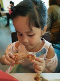 Cute girl holding ice cream