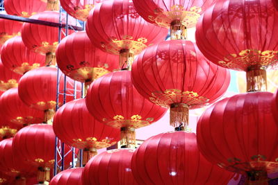 Low angle view of lanterns hanging on ceiling