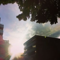 Low angle view of building against sky during sunset