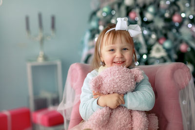 Portrait of cute girl with teddy bear