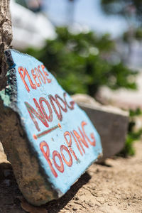 Close-up of text on wall