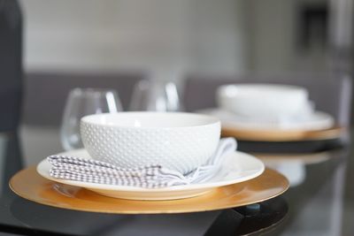 Close-up of kitchen utensils on table in restaurant