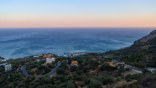 Libyan sea and road with bends at the sunset seen from great sea view, viannos, greece