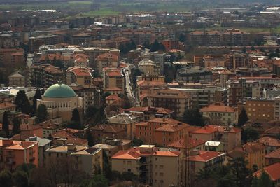 High angle view of illuminated buildings in city