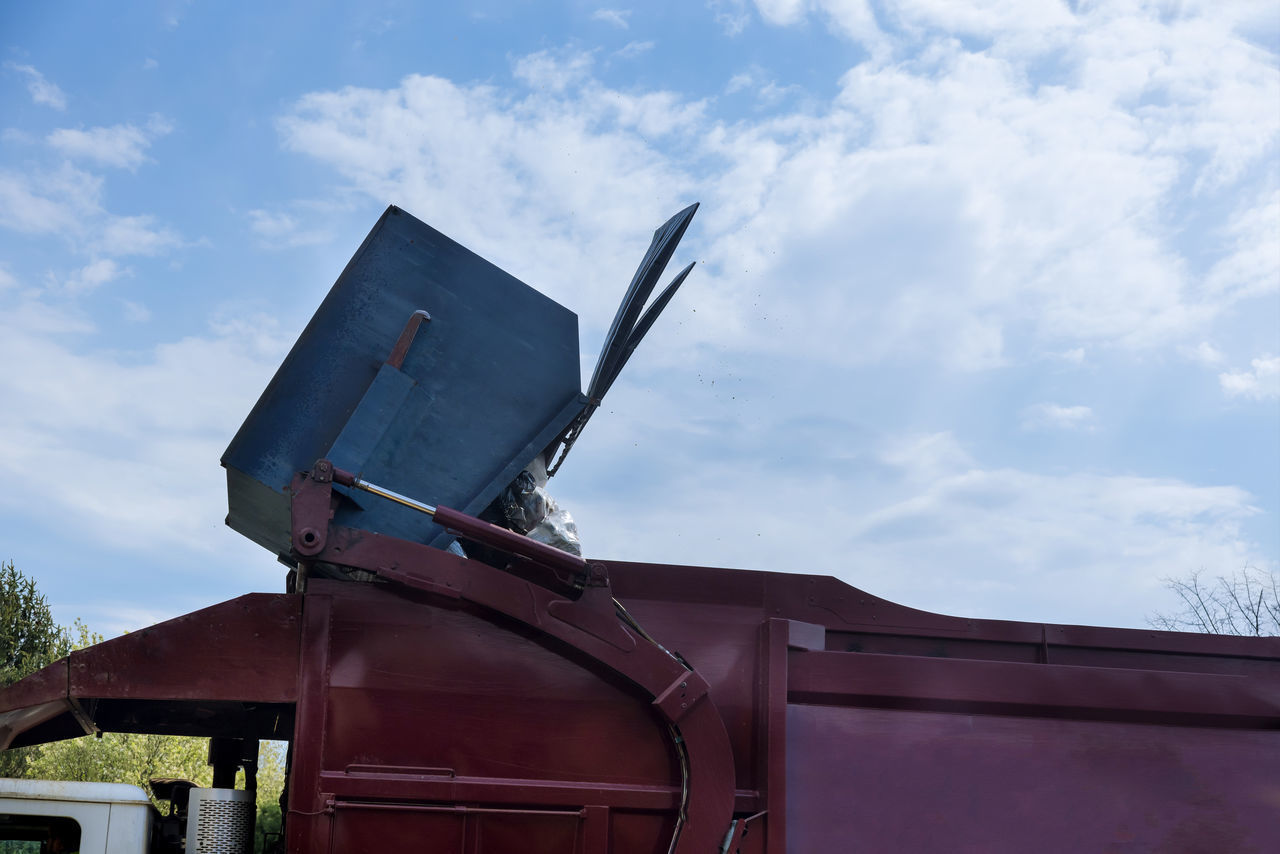 LOW ANGLE VIEW OF TRADITIONAL WINDMILL AGAINST SKY