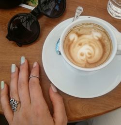 High angle view of coffee cup on table