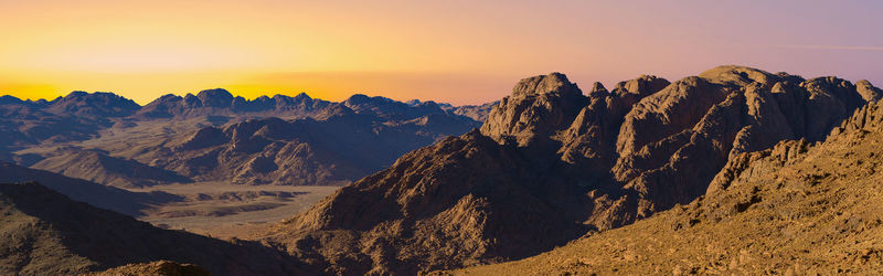 Scenic view of mountain against sky during sunset