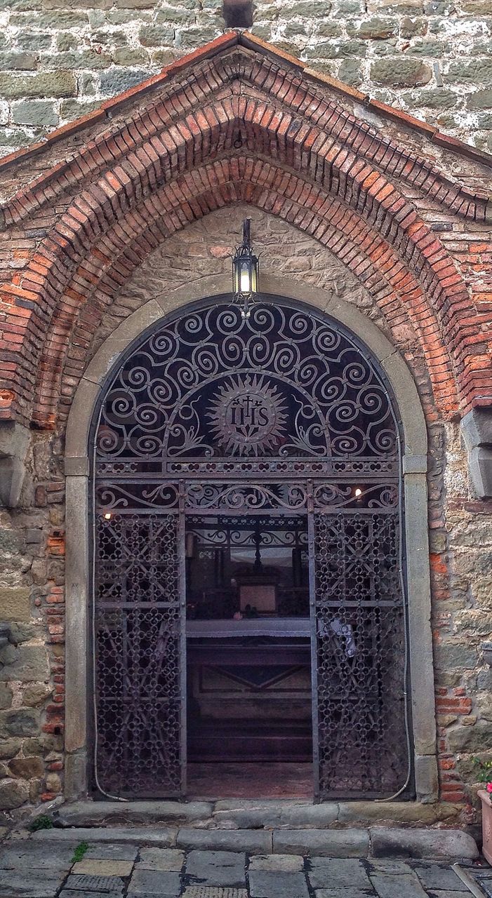 architecture, built structure, building exterior, arch, door, entrance, brick wall, closed, old, wall - building feature, gate, day, history, outdoors, building, no people, ornate, religion, place of worship, pattern