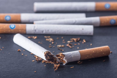 Close-up of cigarettes on table