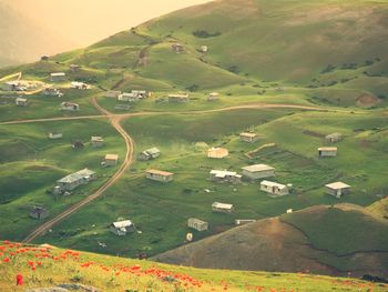 High angle view of agricultural field and buildings