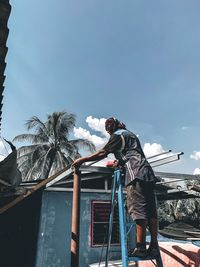 Man standing against sky