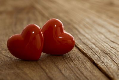 Close-up of red heart shape on table