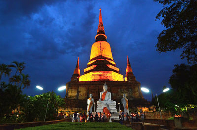 Group of people in temple against building