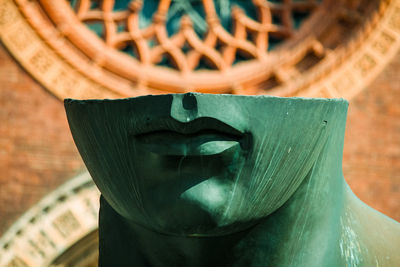 Close-up of statue in basket