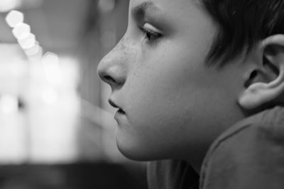 Close-up of boy looking away