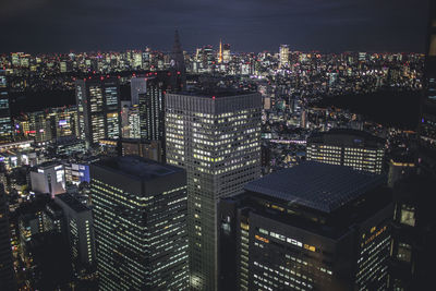 Illuminated cityscape at night