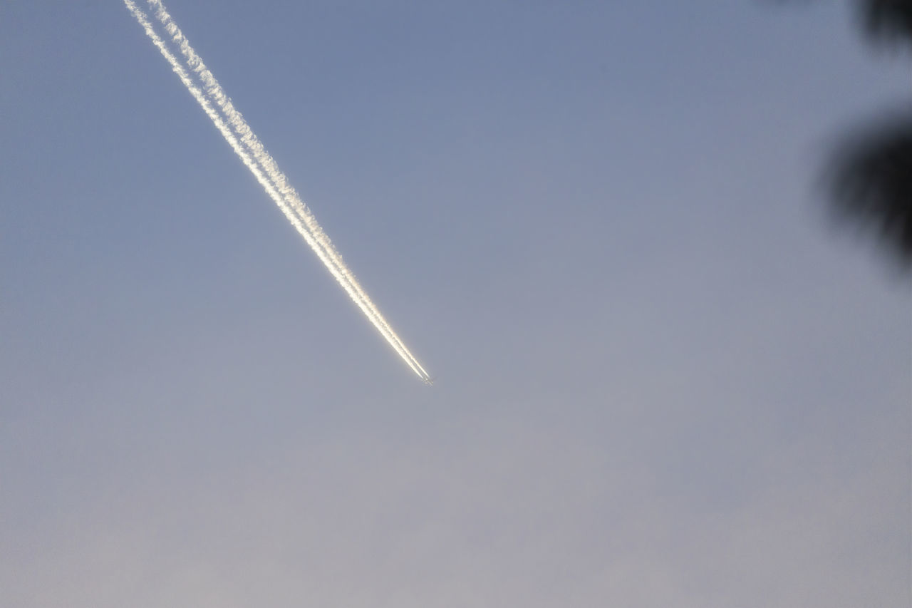 LOW ANGLE VIEW OF VAPOR TRAIL AGAINST SKY