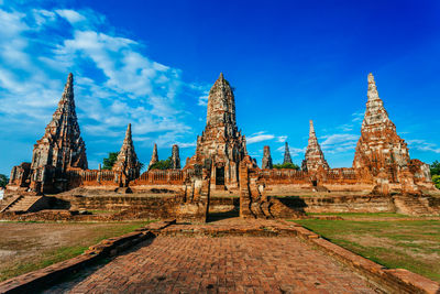 Old temple against building