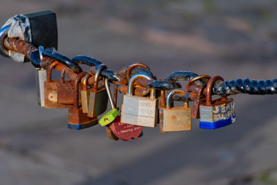 Close-up of padlocks hanging on chain