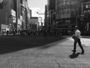 People walking on city street