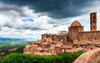 Old building against cloudy sky