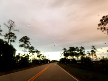 Road against cloudy sky