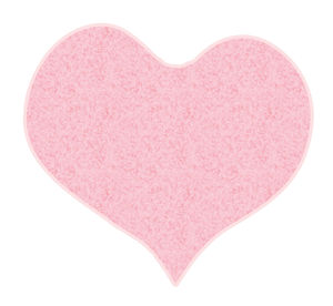 Close-up of heart shape over white background