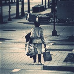 Rear view of woman walking outdoors