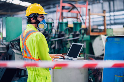 Man working on mobile phone