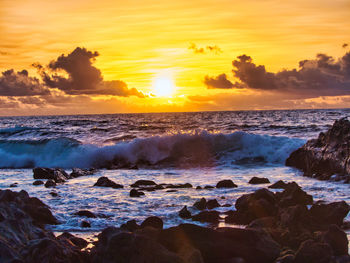 Scenic view of sea against sky during sunset