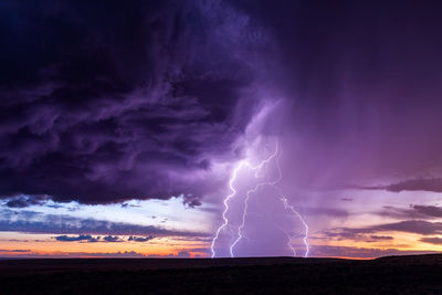 Lightning in sky during sunset