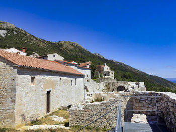 View of historic building against blue sky