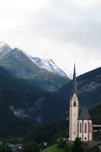 High angle view of church and buildings against sky