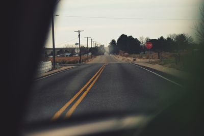 Road against clear sky