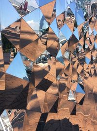 High angle view of umbrellas hanging on glass