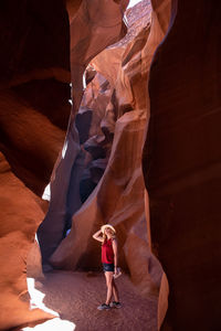 Woman standing on rock