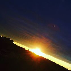 Sun shining through clouds