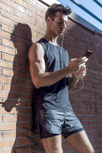 Young woman using mobile phone