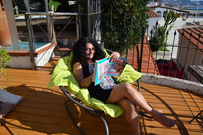 Woman sitting on chair