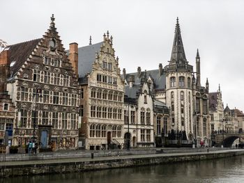 Buildings in city against sky