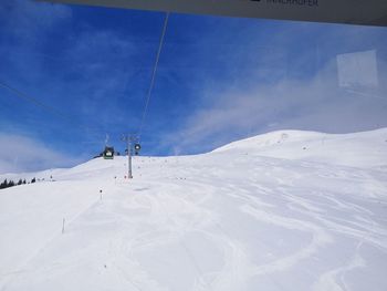 Snow covered mountain against sky